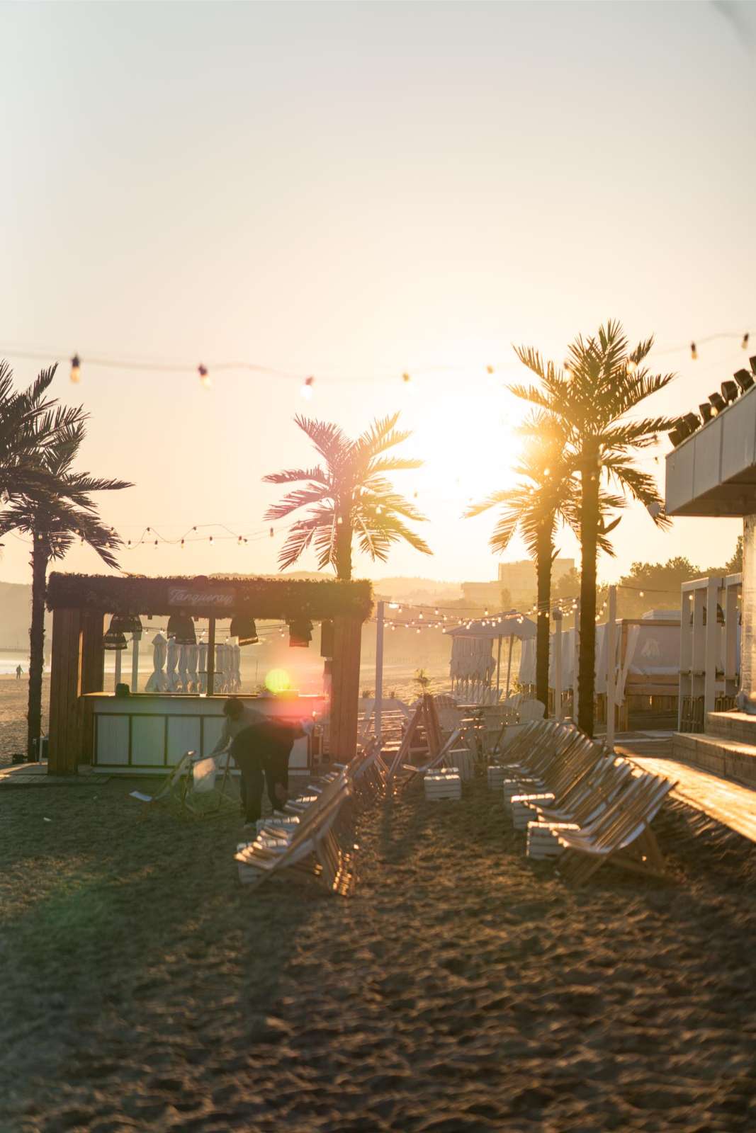 Strand och solnedgång vid Wave Międzyzdroje